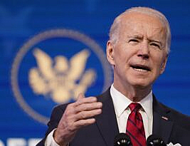 Biden Raises Vaccine Expectations, Expands Travel Bans