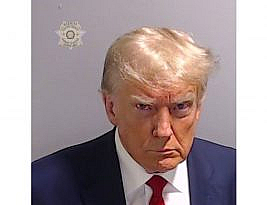 The Art of the Mug Shot: Trump Surrenders in Georgia